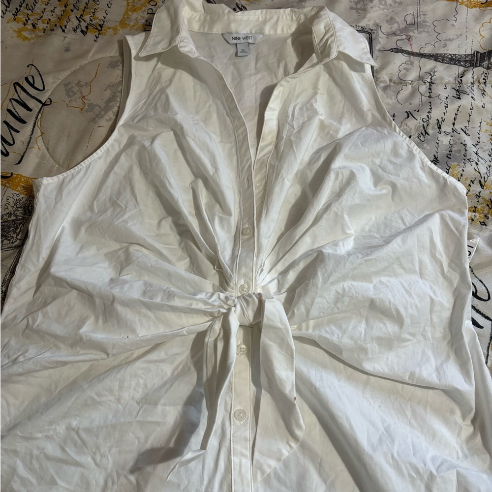 White blouse with front tie.